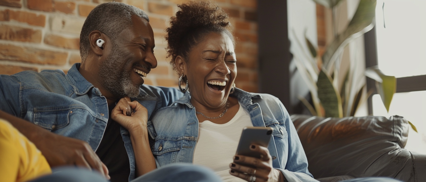 Friends laughing while listening to a song